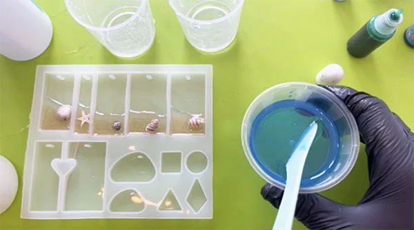 Blue resin being mixed