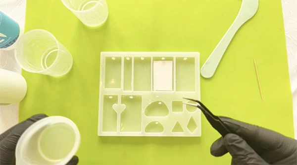 Sticker face down in a silicone mould